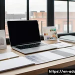 광고디자인 포트폴리오 제작 가이드 - A sleek modern designer’s workspace featuring a high-resolution laptop displaying a clean, minimalis...
